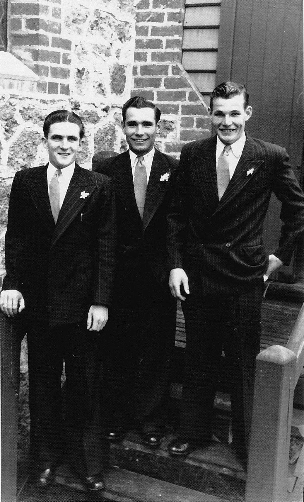 Photo of three young men.